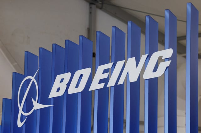 The logo of Boeing company is displayed at the Australian International Airshow in Avalon, Australia March 26, 2025. REUTERS/Hollie Adams/File Photo