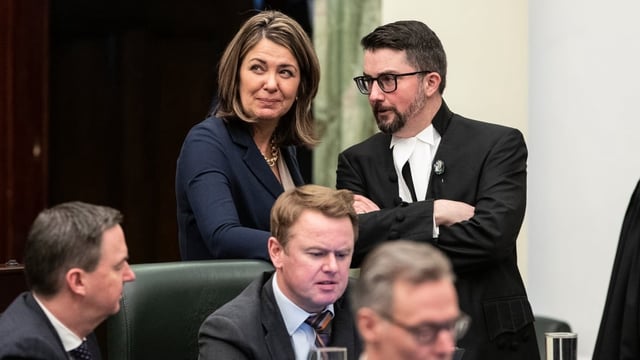 Alberta Premier Danielle Smith chats with Speaker of the House Nathan Cooper before the 2023 budget.