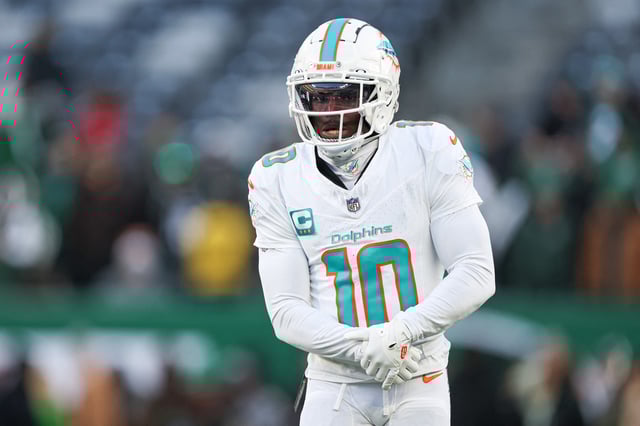 Jan 5, 2025; East Rutherford, New Jersey, USA; Miami Dolphins wide receiver Tyreek Hill (10) on the field before the game against the New York Jets at MetLife Stadium. Mandatory Credit: Vincent Carchietta-Imagn Images/File Photo