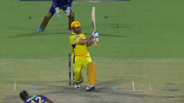 MS Dhoni smashes Andre Russell for a six on the first ball of the final over that all but sealed CSK's win against KKR