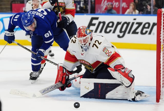 Florida Panthers goaltender Sergei Bobrovsky makes a save as Toronto Maple Leafs&#39; John Tavares battles for the rebound during second period  of Toronto&#39;s win in Game 2 of their playoff series. (Frank Gunn/The Canadian Press via AP)