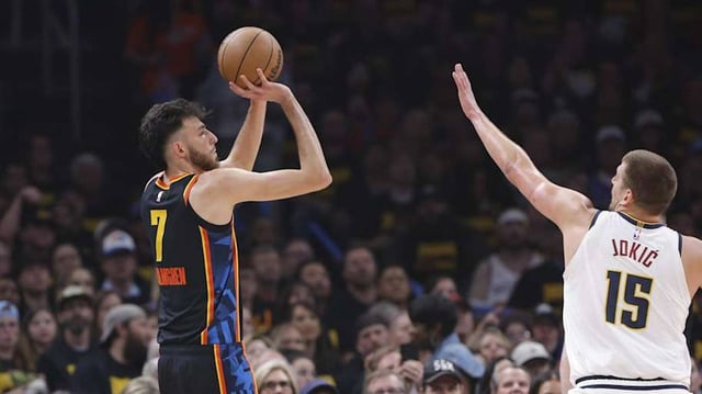 Chet Holmgren shoots against Nikola Jokic in Game 2 of the Western Conference semifinals Wednesday.