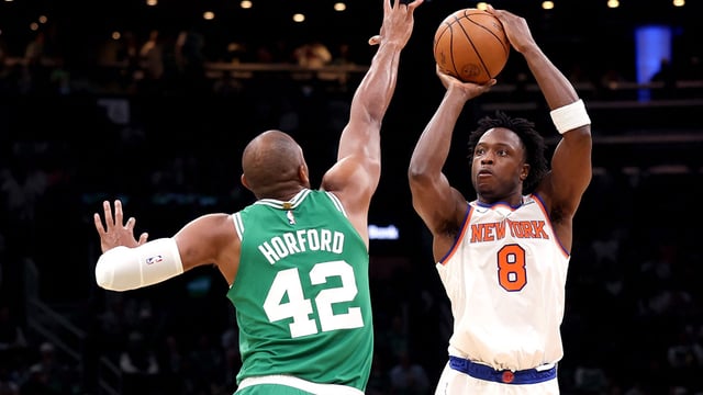 BOSTON, MASSACHUSETTS - MAY 07: OG Anunoby #8 of the New York Knicks attempts a shot against Al Horford #42 of the Boston Celtics during the first quarter in Game Two of the Eastern Conference Second Round NBA Playoffs at TD Garden on May 07, 2025 in Boston, Massachusetts. 