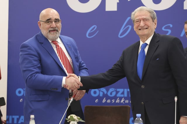 Chris LaCivita, who served as co-campaign manager of Donald Trump's successful 2024 presidential campaign, shakes hands with Sali Berisha, leader of Albania's main opposition center-right Democratic Party that he is consulting for the upcoming May 11 parliamentary election, in Tirana, Albania, Feb. 10, 2025. (AP Photo)