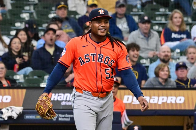 May 7, 2025; Milwaukee, Wisconsin, USA;  Houston Astros starting pitcher Framber Valdez (59) reacts after throwing out Milwaukee Brewers third baseman Vinny Capra (not pictured) in the seventh inning at American Family Field. Mandatory Credit: Benny Sieu-Imagn Images