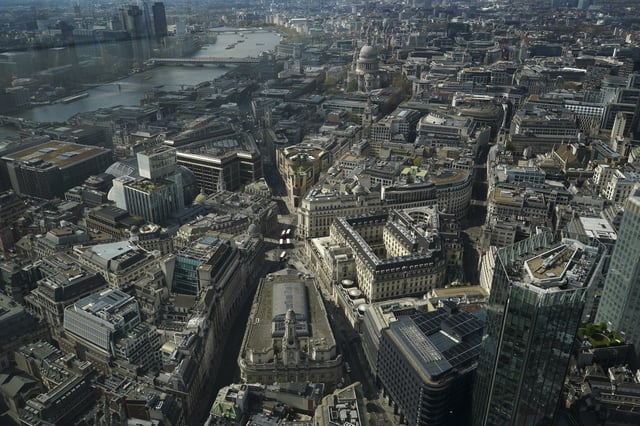 View of the Bank of England and the Royal Exchange from the Lookout viewing point, in London, Wednesday, April 9, 2025. (AP Photo/Alberto Pezzali)