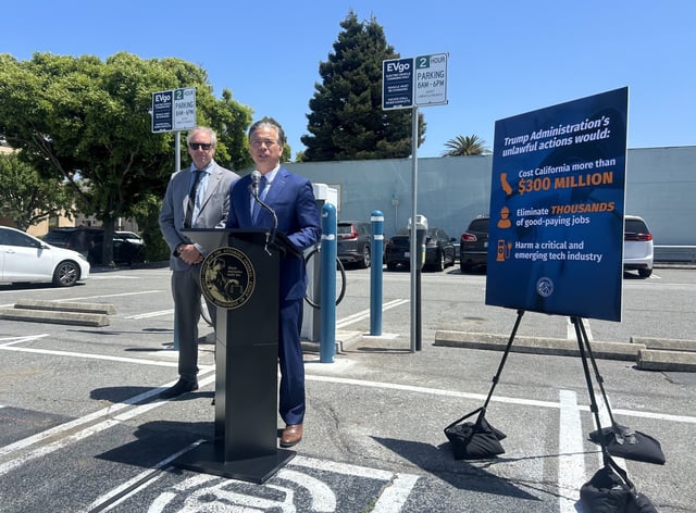 (L-R) Chair of the California Energy Commission David Hochschild and California Attorney General Rob Bonta speak at a press conference on Wednesday, May 7, 2025, in Burlingame, Calif. Bonta announced the filing of a multi-state lawsuit against the Federal Highway Administrations withholding of funds previously approved by Congress for the construction of electric vehicle charging stations. (Alise Maripuu/Bay City News)