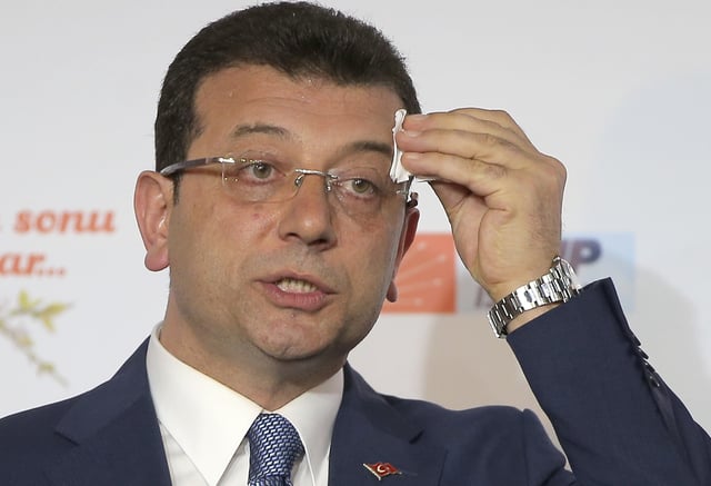 FILE -Ekrem Imamoglu, mayoral candidate for Istanbul of Republican People's Party (CHP) wipes sweat off his forehead during a press conference after the local elections, in Istanbul, March 31, 2019. (AP Photo/File)