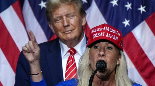U.S. Rep. Marjorie Taylor Greene (R-GA) speaks alongside former President and current presidential hopeful Donald Trump at a campaign event in Rome, Georgia, on March 9, 2024. (Elijah Nouvelage/AFP/Getty Images/TNS)