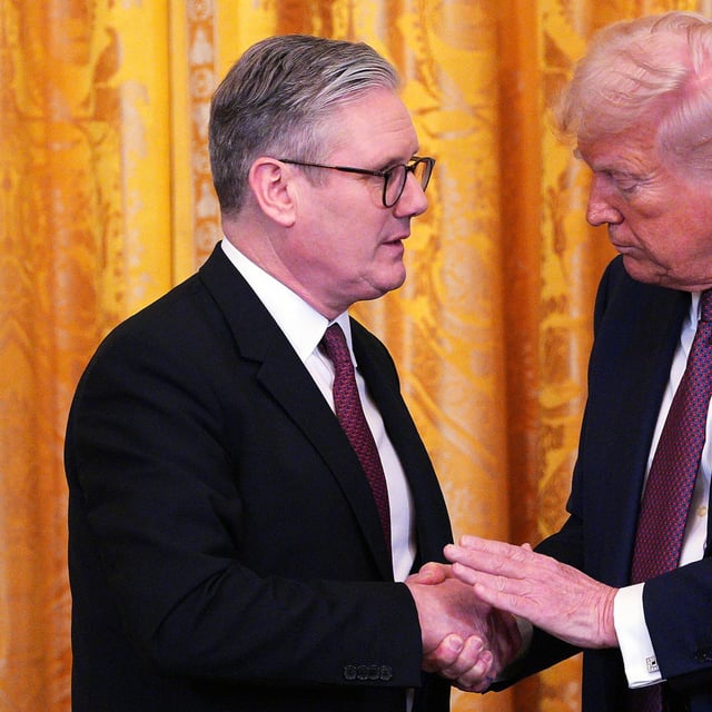 FILE - Britain's Prime Minister Keir Starmer, left, and U.S. President Donald Trump shake hands at a joint press conference in the East Room at the White House Thursday, Feb. 27, 2025, in Washington. (Carl Court/Pool Photo via AP, File)