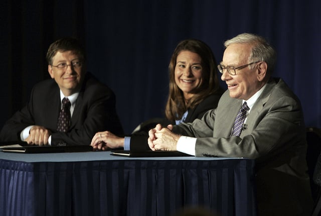 FILE - Bill Gates, left, Melinda Gates and Warren Buffett speak during a press conference, June 26, 2006 in New York. (AP Photo/Seth Wenig, File)