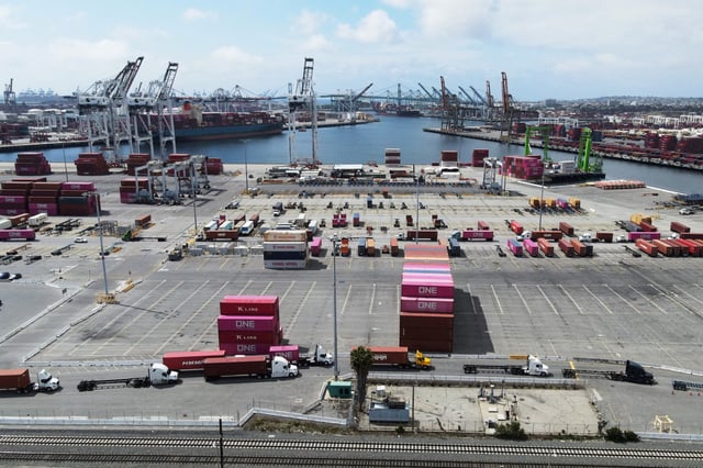 A few shipping containers sit in place at the Port of Los Angeles in San Pedro, California, U.S. May 5, 2025.  REUTERS/David Swanson/File Photo