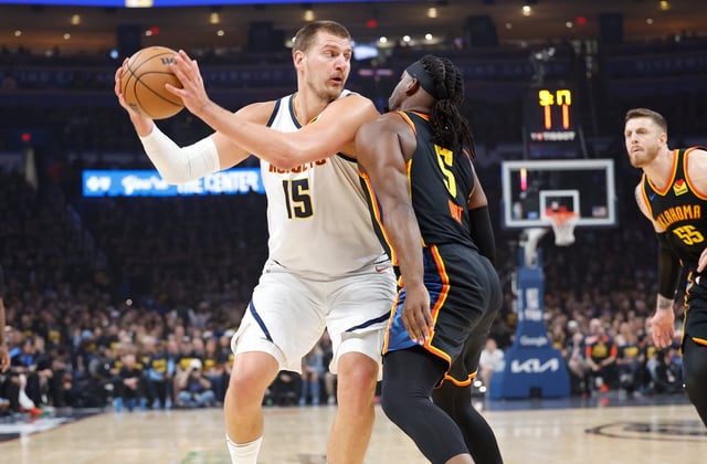 Nuggets center Nikola Jokic makes a move against Thunder guard Luguentz Dort in the first quarter of Game 2 in their second-round NBA playoff series in Oklahoma City.