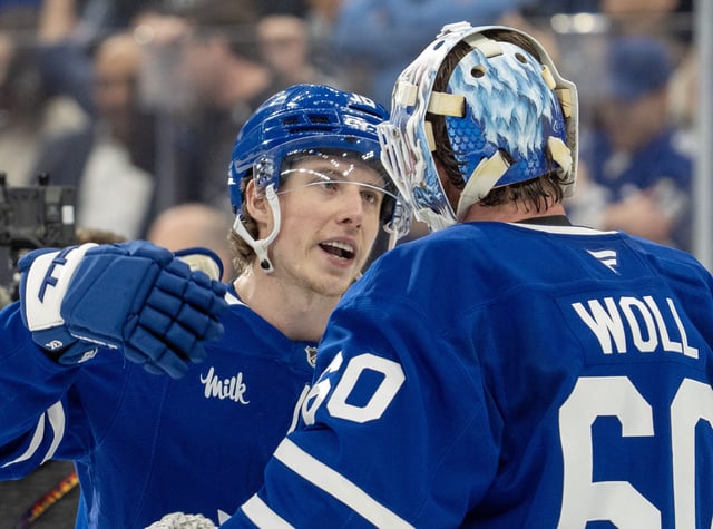Toronto Maple Leafs' Mitch Marner (16) celebrates with goaltender Joseph Woll (60) after defeating the Florida Panthers in NHL playoff hockey action in Toronto on Wednesday, May 7, 2025. THE CANADIAN PRESS/Frank Gunn