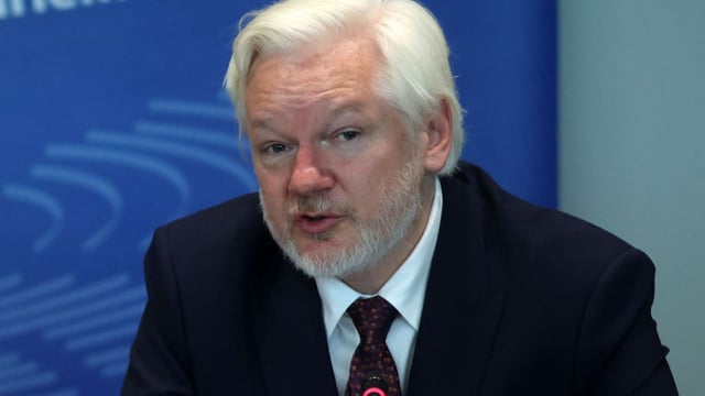 STRASBOURG, FRANCE - OCTOBER 01: Julian Assange, founder of Wikileaks, answers questions during a hearing at the European council on October 01, 2024 in Strasbourg, France. Julian Assange's testimony before the Committee on Legal Affairs and Human Rights in Strasbourg, France, marks his first public appearance since his return to Australia, following his release from prison in the UK. In June, the Wikileaks founder pled guilty to a felony charge under the Espionage Act, and was sentenced to time served, allowing him to walk free after years of incarceration and intense lobbying for his release from across the political spectrum. (Photo by Johannes Simon/Getty Images)