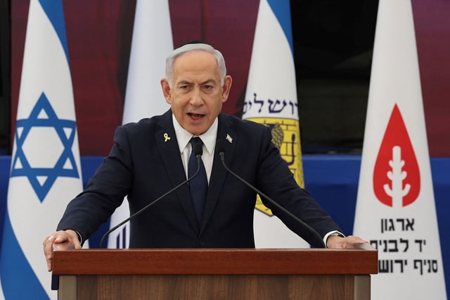 Israeli Prime Minister Benjamin Netanyahu speaks during the annual ceremony at the eve of Israel’s Remembrance Day for fallen soldiers (Yom HaZikaron) at the Yad LaBanim Memorial in Jerusalem, 29 April 2025 . Israel marks Yom HaZikaron, the 'Memorial Day for the Fallen Soldiers of Israel and Victims of Terrorism'.    ABIR SULTAN POOL/Pool via REUTERS
