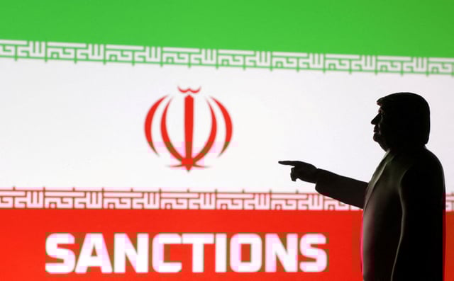 A 3D-printed miniature model depicting U.S. President Donald Trump, Iran flag and word "Sanctions" in this illustration created   April 17, 2025. REUTERS/Dado Ruvic/Illustration/File Photo