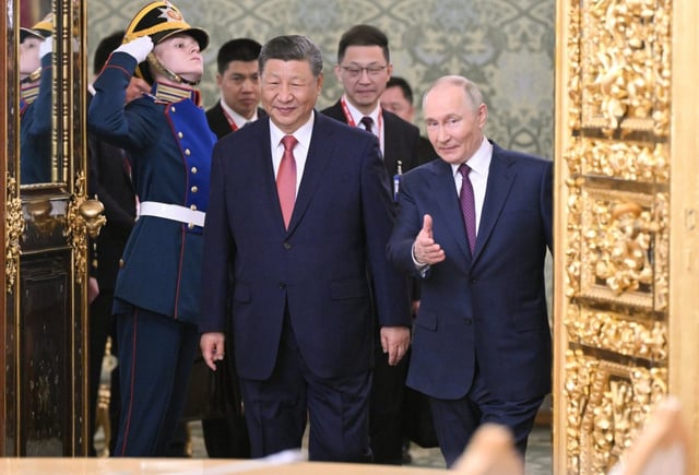 Vladimir Putin and Xi Jinping in Moscow today (Photo: Alexei Danichev/RIA Novosti/Getty)