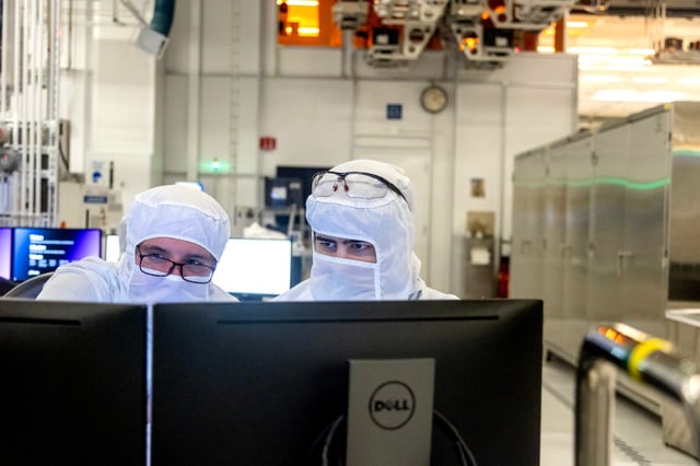 Workers at a clean room at Micron Technology headquarters in Boise, Idaho.