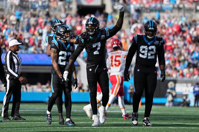 CHARLOTTE, NORTH CAROLINA - NOVEMBER 24: car7 reacts after a sack during the second quarter against the Kansas City Chiefs at Bank of America Stadium on November 24, 2024 in Charlotte, North Carolina.