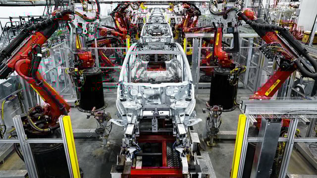 Tesla Model Y electric vehicles on a production line at the company&#39;s factory and headquarters in Austin. Austin-based Tesla launched a more affordable version of its Model Y vehicle in the US this week. 