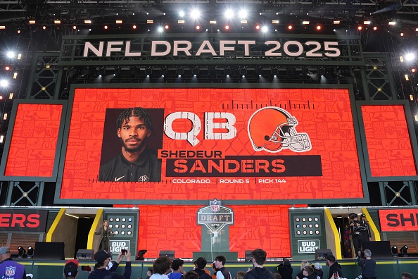 GREEN BAY, WISCONSIN - APRIL 26: A screen shows Colorado quarterback Shedeur Sanders' name after being selected by the Cleveland Browns with the 144th overall pick during the fifth round of the 2025 NFL Draft on April 26, 2025 in Green Bay, Wisconsin. (Photo by Perry Knotts/Getty Images)