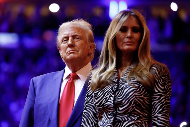 Republican presidential nominee, former U.S. President Donald Trump and Melania Trump take the stage at the campaign rally at Madison Square Garden on October 27, 2024 in New York City. 