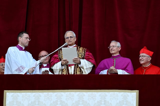 Newly elected Pope Leo XIV, Cardinal Robert Prevost of the United States speaks from the balcony of St. Peter's Basilica, at the Vatican, May 8, 2025. Vatican Media/Francesco Sforza/Handout via REUTERS