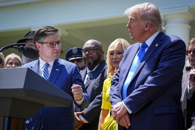 Mike Johnson and Donald Trump in the Rose Garden of the White House on May 1, 2025.
