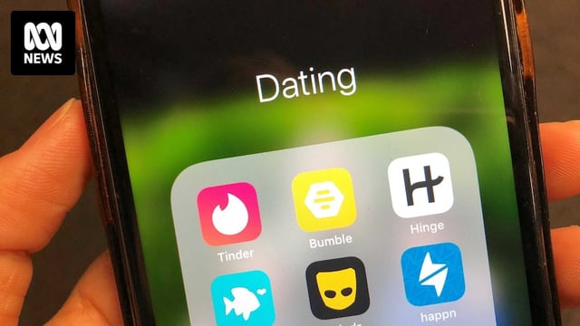 A close up photo of a phone with dating apps like Tinder, Grindr and Bumble on the screen.