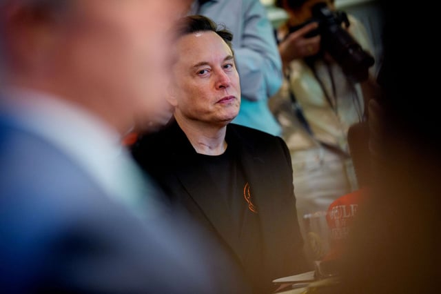 Tesla CEO Elon Musk looks on during a cabinet meeting at the White House on April 30, 2025, in Washington, D.C.