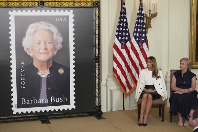 First lady Melania Trump, seated left, and Dorothy Bush Koch look on after unveiling a U.S. Postal Service Stamp honoring former first lady Barbara Bush, Thursday, May 8, 2025, in the East Room of the White House in Washington. (AP Photo/Jacquelyn Martin)