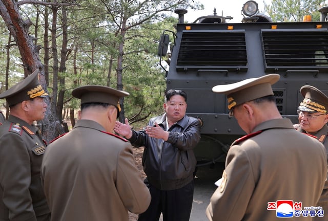 A handout photo shows North Korean leader Kim Jong Un supervise a missile test, in North Korea, May 8, 2025. KCNA via REUTERS