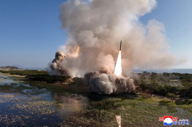 A handout photo shows missiles being launched, in North Korea, May 8, 2025. KCNA via REUTERS