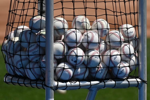 Apr 12, 2025; Chicago, Illinois, USA; Baseballs are seen in a basket during batting practice prior to a Chicago White Sox game at Rate Field. Mandatory Credit: Patrick Gorski-Imagn Images/File Photo