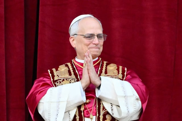 Newly elected Pope Leo XIV, Robert Prevost arrives on the main central loggia balcony of the St Peter&#39;s Basilica for the first time, after the cardinals ended the conclave, in The Vatican, on May 8, 2025. Robert Francis Prevost was on Thursday elected the first pope from the United States, the Vatican announced. A moderate who was close to Pope Francis and spent years as a missionary in Peru, he becomes the Catholic Church&#39;s 267th pontiff, taking the papal name Leo XIV. (Photo by Alberto PIZZOLI / AFP) (Photo by ALBERTO PIZZOLI/AFP via Getty Images)