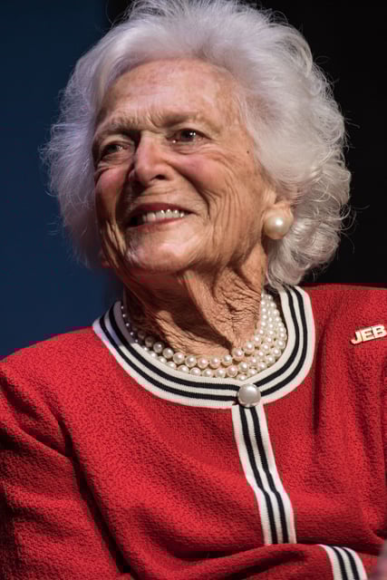 Former first lady Barbara Bush listens to her son Jeb Bush at a campaign event February 19, 2016 in Greenville, South Carolina.