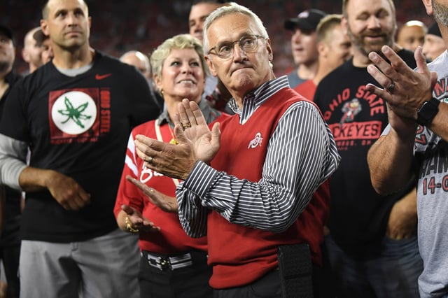 Former Ohio State head coach Jim Tressel watches a scoreboard tribute for the 2002 national championship team during the second quarter of an NCAA college football game between Notre Dame and Ohio State, in Columbus, Ohio, on Sept. 3, 2022.