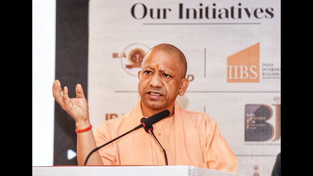 Uttar Pradesh chief minister Yogi Adityanath addresses the gathering during India Bullion and Jewellers Association (IBJA) conclave, at Clarks Avadh in Lucknow on Thursday. (ANI)