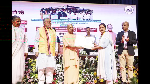UP CM Yogi Adityanath attends a programme organised in Lucknow for distribution of appointment letters to 494 newly selected Assistant Teachers (LT) and 49 Lecturers for Government Secondary Schools by UPPSC. (PTI)