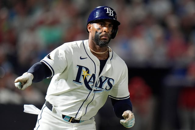 Tampa Bay Rays&#39; Yandy Díaz celebrates his three-run home run off Philadelphia Phillies pitcher Tanner Banks during the seventh inning of a baseball game Thursday, May 8, 2025, in Tampa, Fla. (AP Photo/Chris O&#39;Meara)