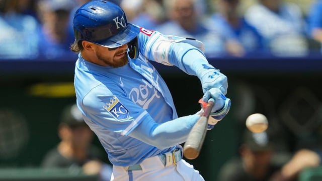 May 8, 2025; Kansas City, Missouri, USA; Kansas City Royals shortstop Bobby Witt Jr. (7) hits a single during the third inning against the Chicago White Sox at Kauffman Stadium. Mandatory Credit: Jay Biggerstaff-Imagn Images