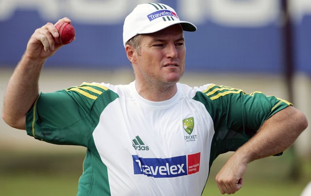 Australia's Stuart MacGill prepares to bowl a delivery during a practice session at Kingsmead in Durban, South Africa March 23, 2006. REUTERS/Howard Burditt/File Photo