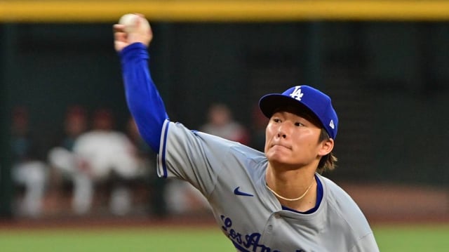 May 1, 2024; Phoenix, Arizona, USA; Los Angeles Dodgers pitcher Yoshinobu Yamamoto (18) throws in the first inning against the Arizona Diamondbacks at Chase Field.