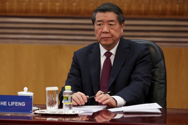 Chinese Vice Premier He Lifeng attends a meeting with global business leaders at the Great Hall of the People in Beijing, China, March 28, 2025. REUTERS/Florence Lo