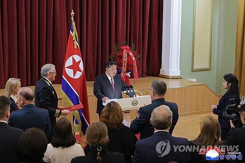 This image, published by the Korean Central News Agency, shows North Korean leader Kim Jong-un (at podium) giving a speech during his visit to the Russian Embassy in Pyongyang on May 9, 2025, on the occasion of Russia's 80th Victory Day. (For Use Only in the Republic of Korea. No Redistribution) (Yonhap)