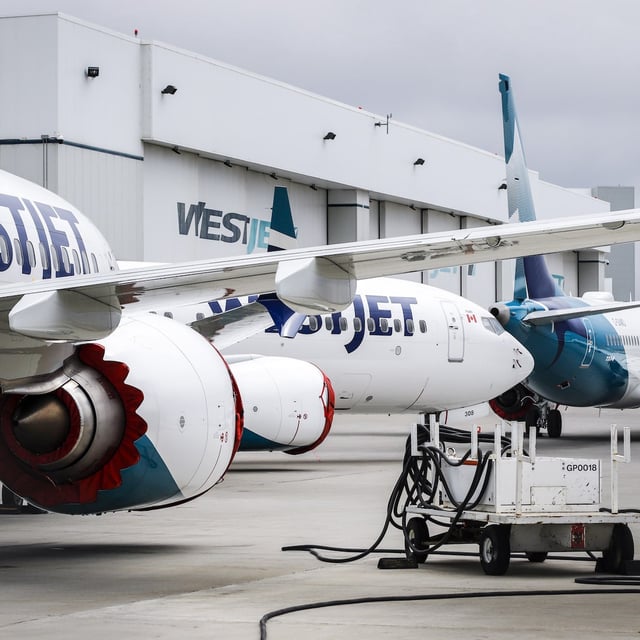 WestJet Boeing 737 Max aircraft are shown at the airline's facilities in Calgary, Alta., Tuesday, May 7, 2019. WestJet is cancelling flights ahead of a possible strike its mechanics union. THE CANADIAN PRESS/Jeff McIntosh
