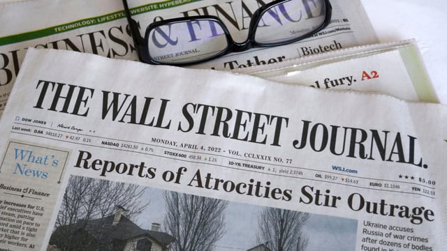 Dow Jones, owner of The Wall Street Journal, reported revenues of $575 million in the quarter