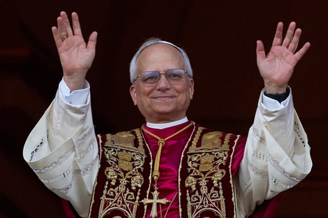 The Pope wearing the cross