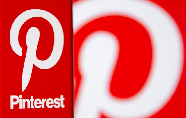 A Pinterest logo is seen on a smartphone in this illustration taken October 20, 2021. REUTERS/Dado Ruvic/Illustration/File photo